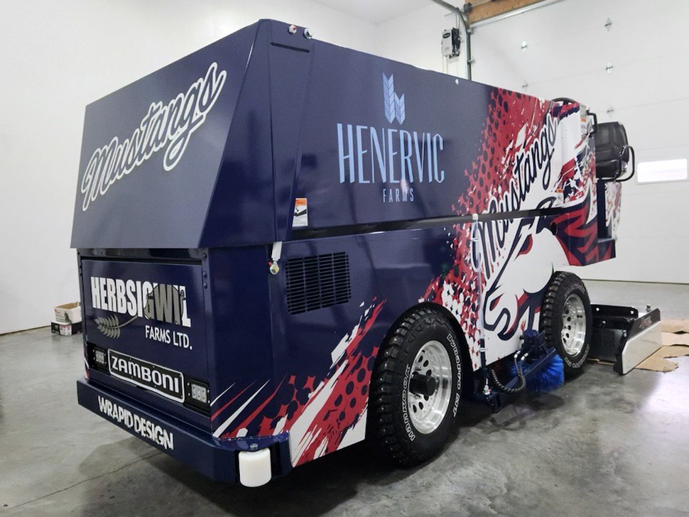 New fully wrapped Zamboni cleaning the ice at Mitchell arena